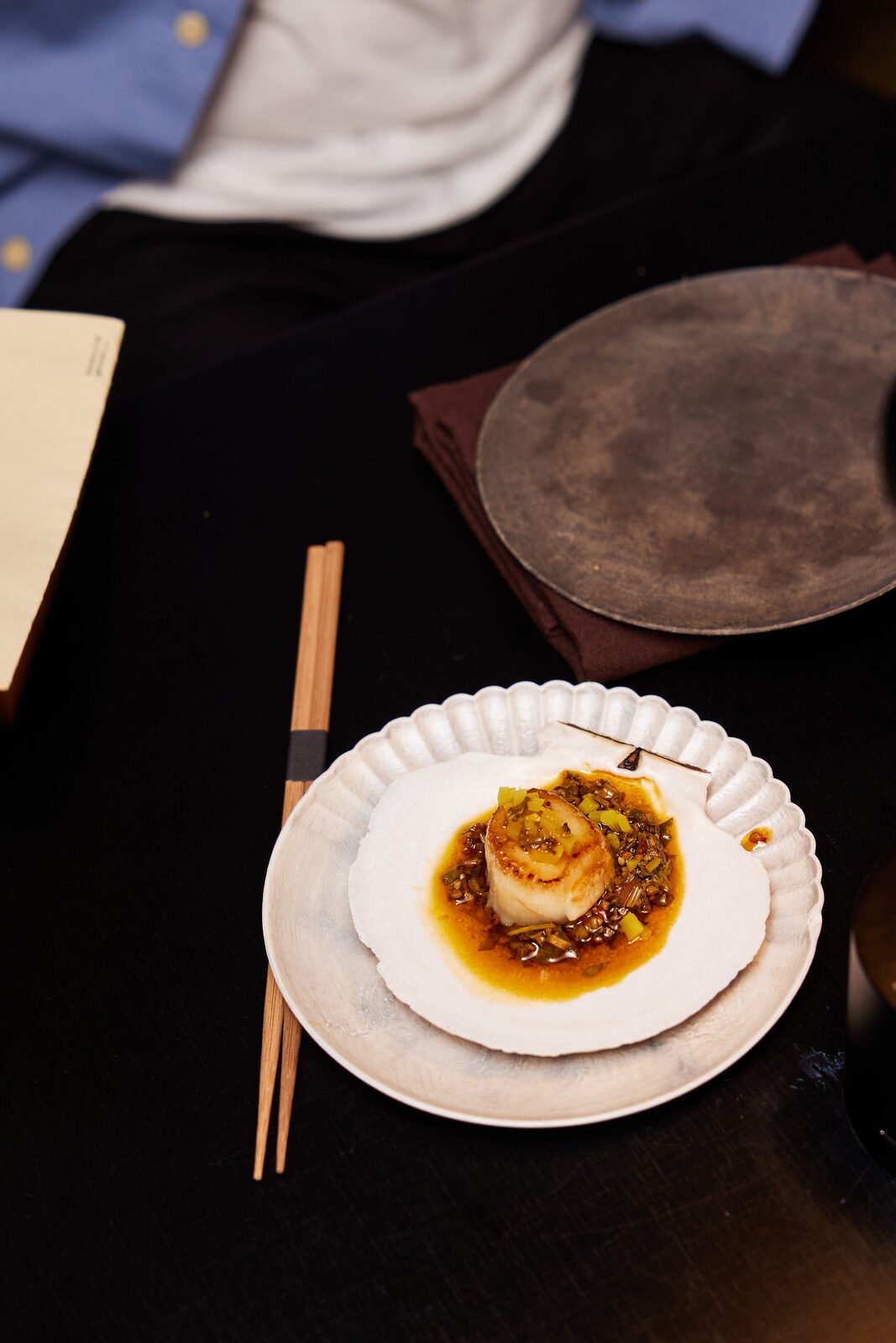 Scallop plated at the counter