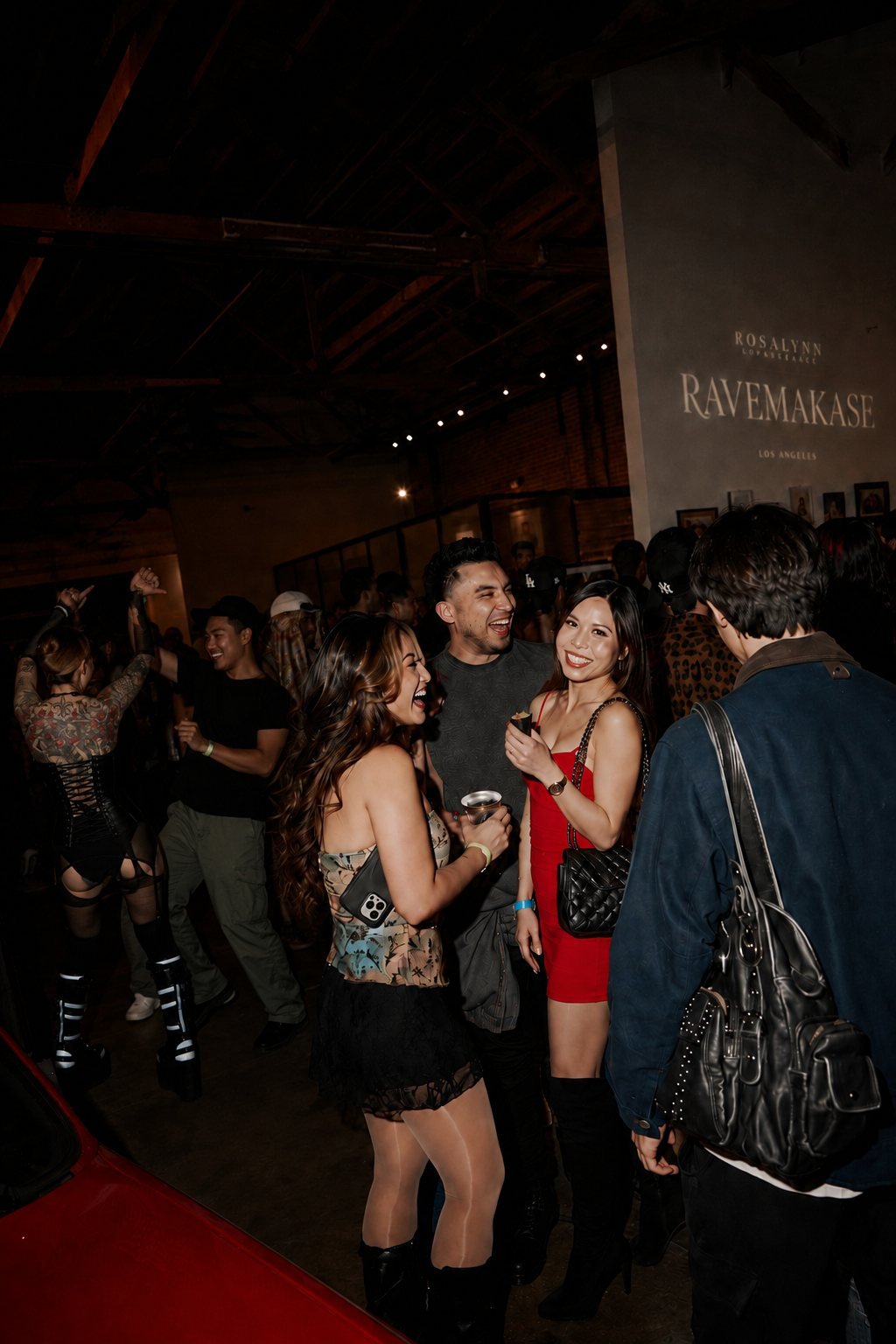Guests laughing at a Rosalynn Ravemakase night